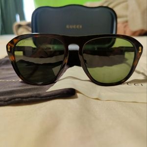 Gucci Sunglasses GG0128s